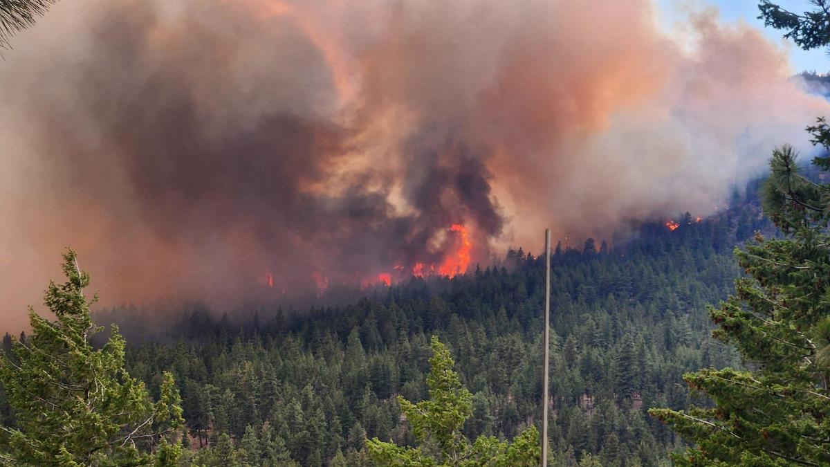 Canadian wildfire that forced 20,000 to flee may signal 'new normal'